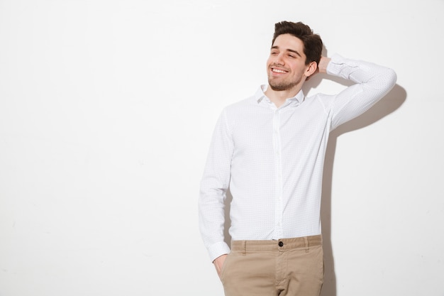 Portrait of a smiling young man dressed in shirt