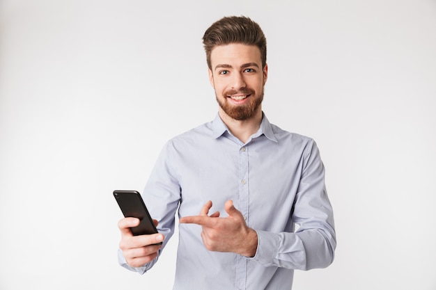 Portrait of a smiling young man dressed in shirt