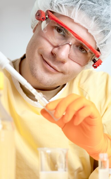 Portrait of smiling young microbiologist