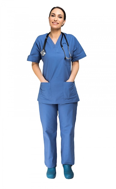 Portrait of a smiling young nurse full length