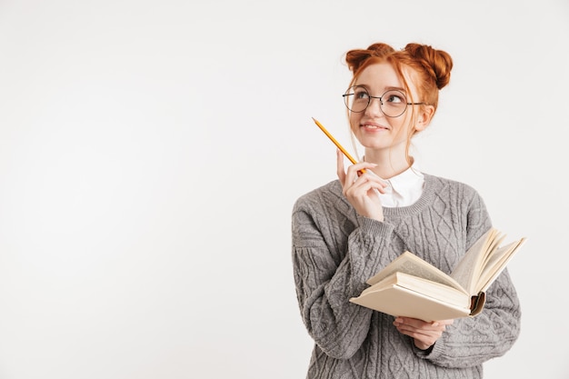 Portrait of a smiling young school nerd woman