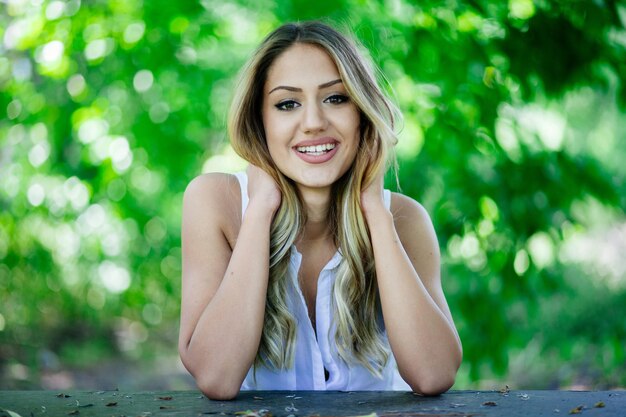 Portrait of smiling young woman outdoors