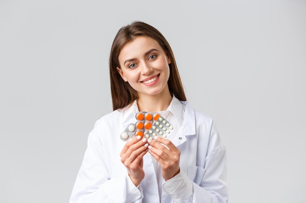 Photo portrait of a smiling young woman over white background