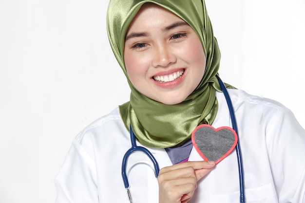 portrait of a smiling young woman over white background