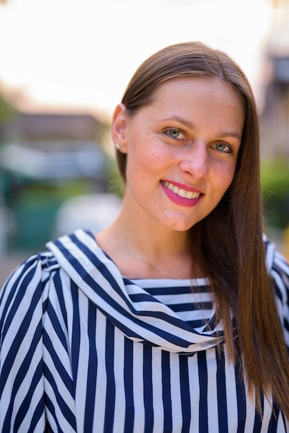 Portrait of a smiling young woman