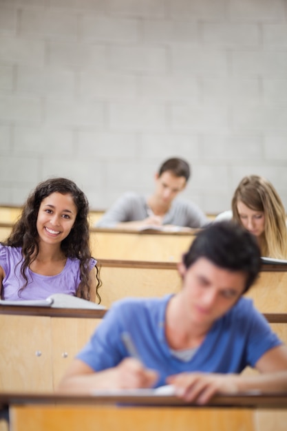 Photo portrait of students during a lecture