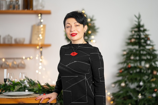 Portrait of stylish adult brunette woman celebrating New Years.