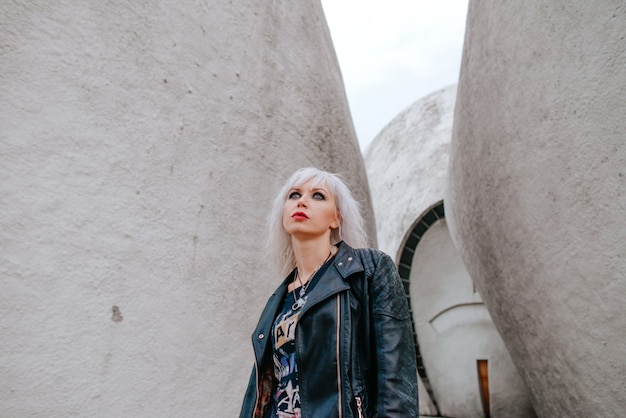 portrait of stylish blonde grunge young woman