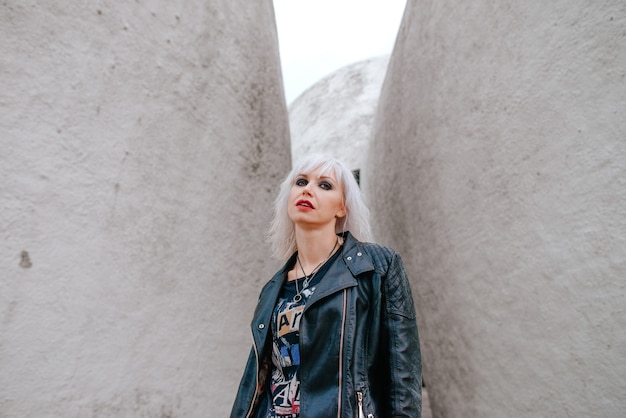 portrait of stylish blonde grunge young woman