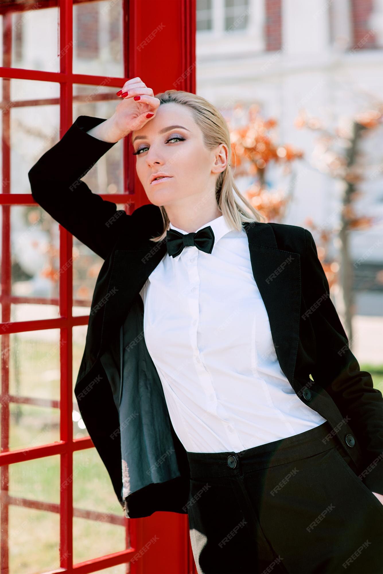 Premium Photo | Portrait of stylish fashionable beautiful blonde woman in man black suit with bow tie outdoor Premium Photo | Portrait Of Stylish Fashionable Beautiful Blonde Woman In Man Black Suit With Bow Tie Outdoor
