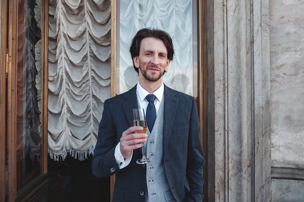 Portrait stylish man in suit posing