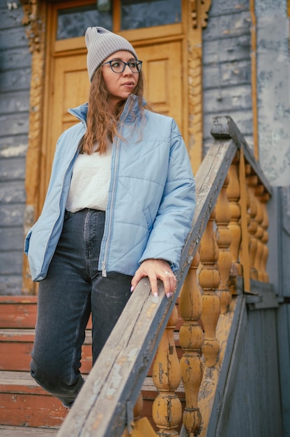 Portrait of a stylish woman in blue jacket spring outdoor portrait