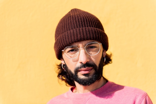 Portrait of a stylish young man looking at camera