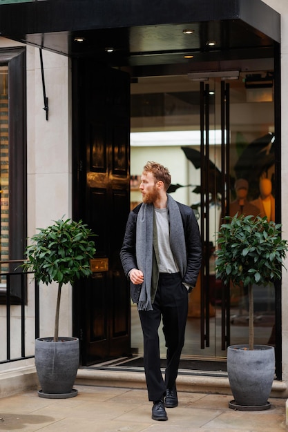 Portrait of a stylishly dressed bearded man on the street