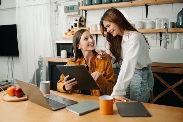 Portrait of success business people working together in home office couple teamwork startup concept