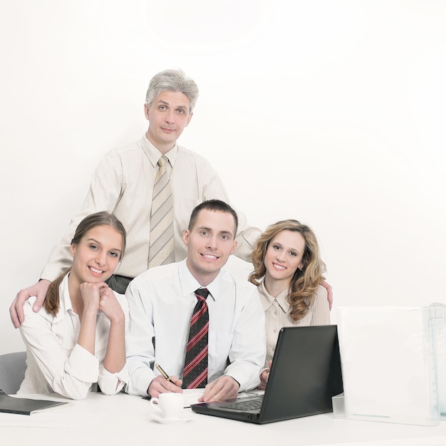 Portrait of successful business team in the workplace in the of