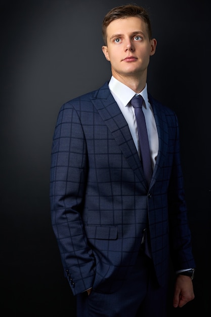 Portrait of successful entrepreneur guy in classic tuxedo i