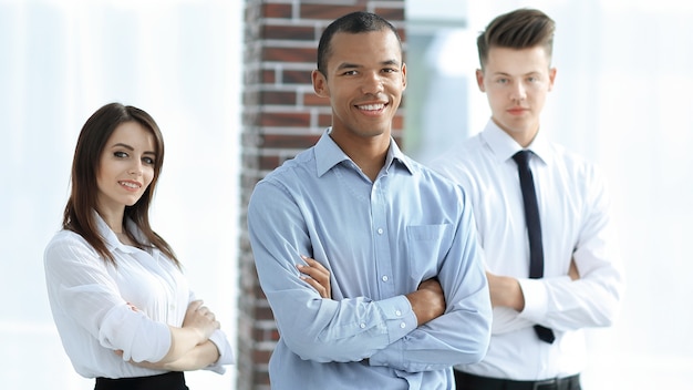 Portrait of a successful group of business people on the background of the office