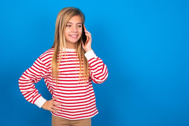 Portrait of successful joyful girl talking on mobile phone with friend Lifestyle and communication