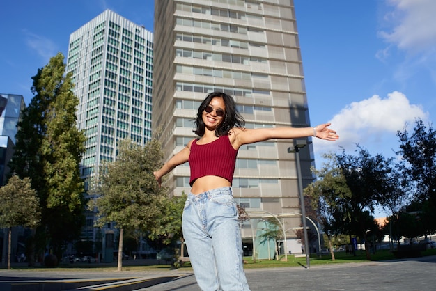 Portrait of a successful young asian woman looking at the camera planning the future life and joy co...