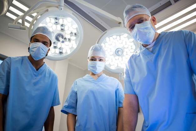 Portrait of surgeon standing in operation room