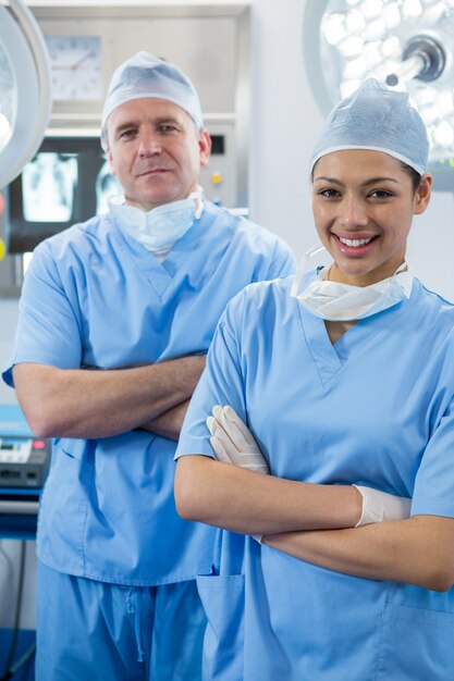 Portrait of surgeons standing in operation theater