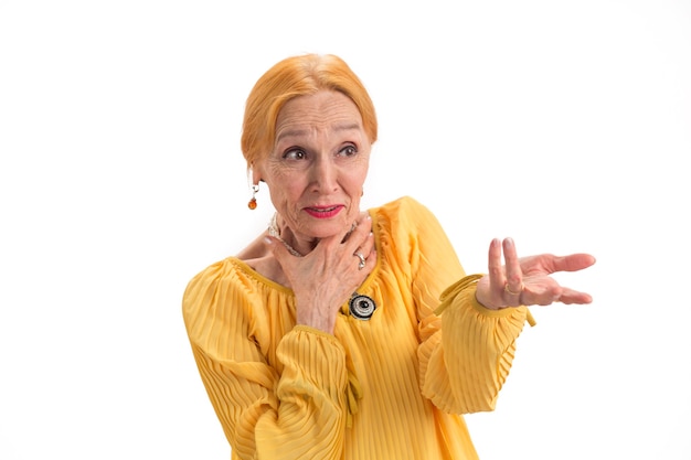 Portrait of surprised old woman scared lady looking aside how to deal with fear