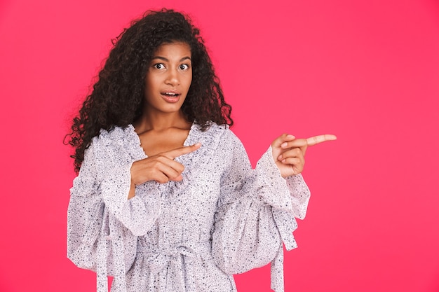 Portrait of a surprised young african woman