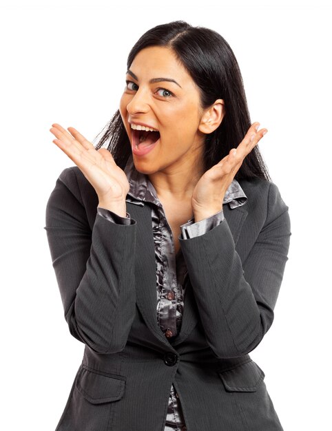 Photo portrait of a surprised young woman isolated on white