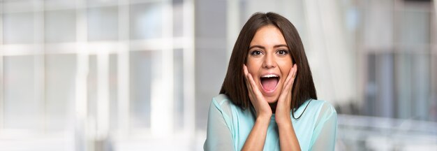 Portrait of a surprised young woman. very large image with lots of copy-space