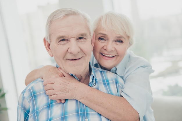 Portrait of sweet couple cuddling