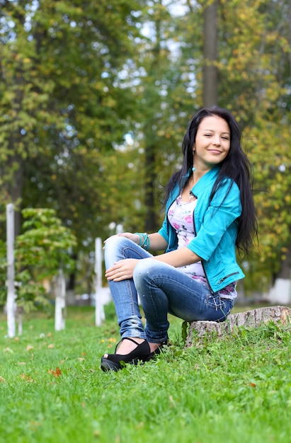 Portrait of sweet young woman enjoying at the park - Outdoor