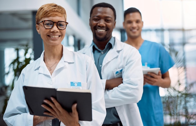 Portrait team of doctors working in hospital research planning and management for healthcare service Leadership mindset and manager or medical professional with black people staff in clinic career
