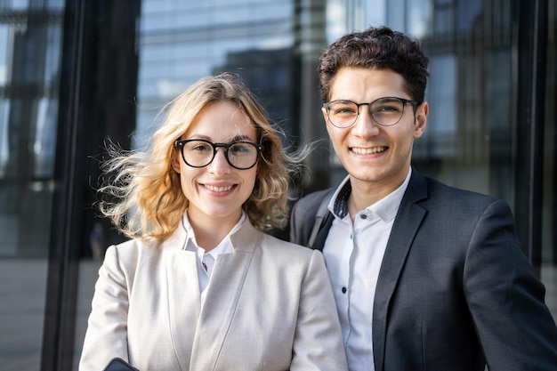 Photo portrait of a team with glasses business meeting discussion a woman and a man people in business