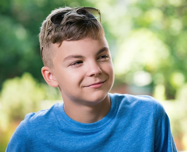 Portrait of a teen boy 1214 year old with sunglasses