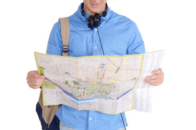Portrait of teen turist traveling with map