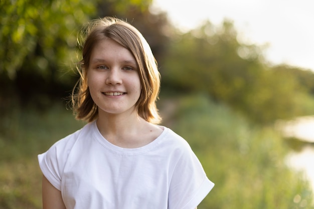 Portrait of a teenage girl in nature