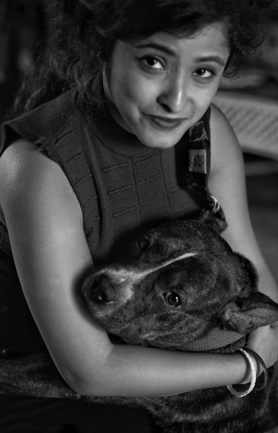 Photo portrait of teenage girl with dog