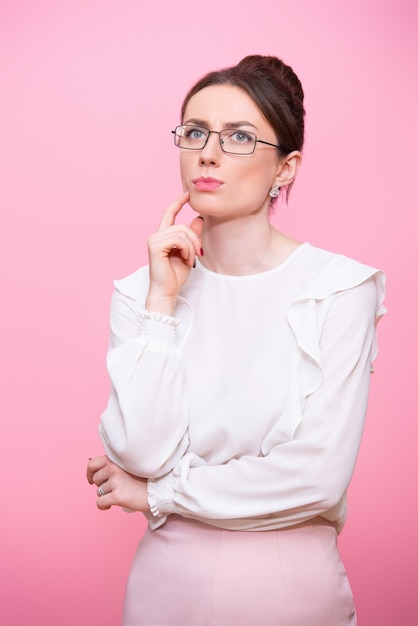 Portrait of a thoughtful business woman with glasses