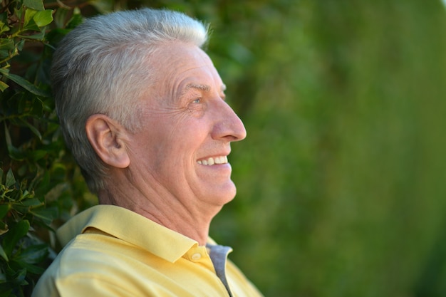 Portrait of thoughtful senior man  in  park