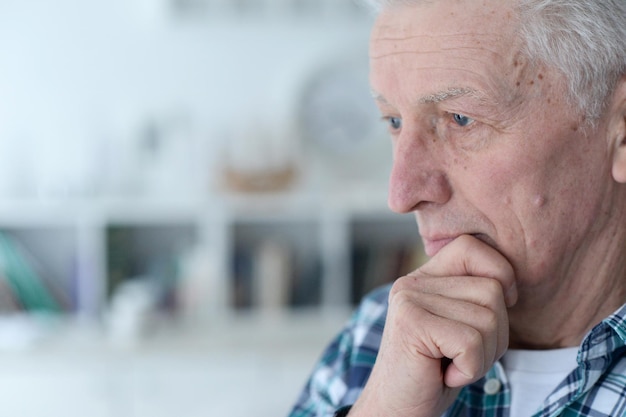 Portrait of thoughtful senior man