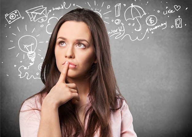 Portrait of  Thoughtful woman on background