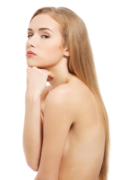 Photo portrait thoughtful young woman with hand on chin against white background