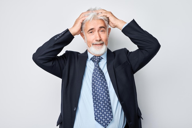 Photo portrait of tired adult man with sad face feeling emotional burnout on white background nerves stress uncertainty concept