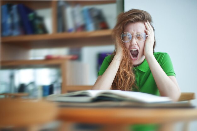 boring homework pictures Photo portrait of tired overworked exhausted young woman in glasses college or university student is study