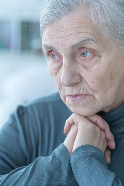 Portrait of tired senior woman