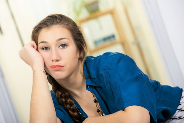 A portrait of a tired young woman