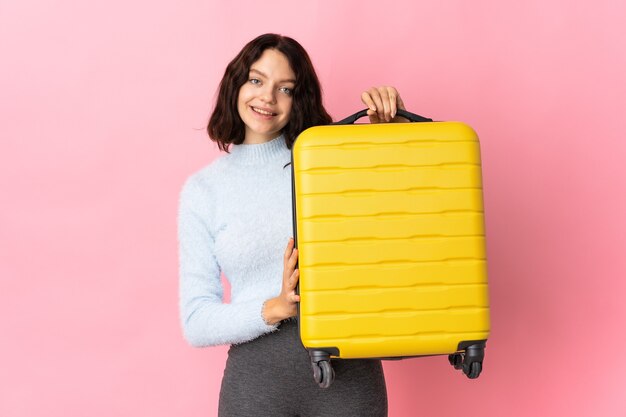 Ragazza del viaggiatore del ritratto con i bagagli