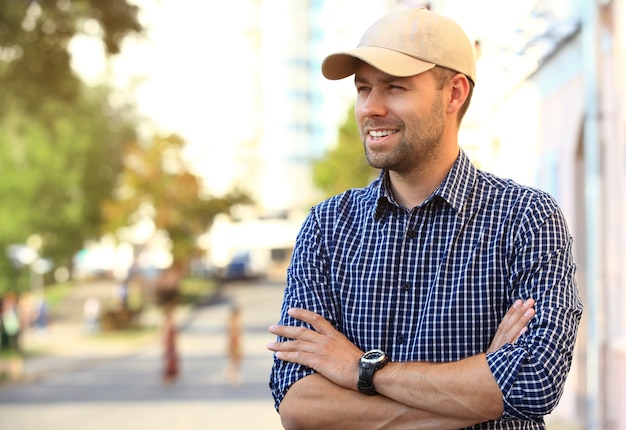 Portrait of a trendy young man in the city