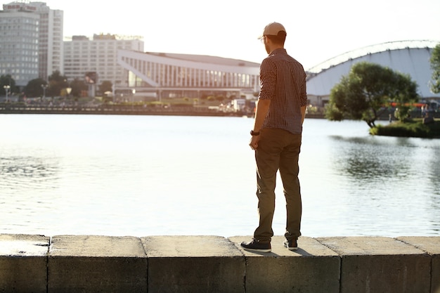 Portrait of a trendy young man in the city